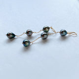 Three long South Sea pearl earrings 