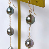 Three long South Sea pearl earrings 