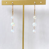 ラウンドカットオパールの三連ピアス