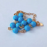 スリーピングビューティーターコイズの丸玉ステーションブレスレット