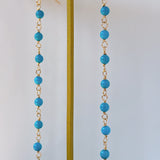 スリーピングビューティーターコイズの丸玉小ステーションロングピアス