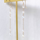 ラウンドカットオパールのステーションロングピアス