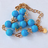 スリーピングビューティーターコイズの丸玉ステーションブレスレット