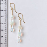 ラウンドカットオパールの三連ピアス