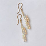 ラウンドカットオパールのダブルラインピアス