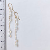 ラウンドカットオパールのステーションロングピアス