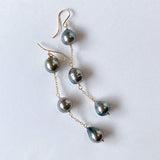 Three long South Sea pearl earrings 