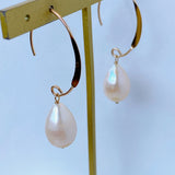 Single large drop freshwater pearl earrings 