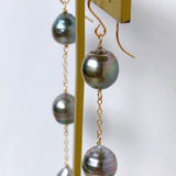 Three long South Sea pearl earrings 