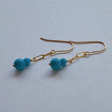 スリーピングビューティーターコイズの丸玉ダブルピアス