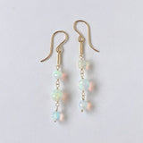 ラウンドカットオパールの三連ピアス