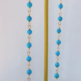 スリーピングビューティーターコイズの丸玉小ステーションロングピアス