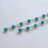 スリーピングビューティーターコイズの丸玉小ステーションロングピアス