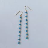 スリーピングビューティーターコイズの丸玉小ステーションロングピアス