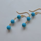 スリーピングビューティーターコイズの丸玉三連ピアス