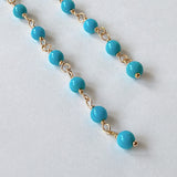 スリーピングビューティーターコイズの丸玉小ステーションロングピアス