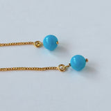 スリーピングビューティーターコイズの丸玉アメリカンピアス