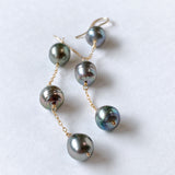 Three long South Sea pearl earrings 