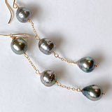 Three long South Sea pearl earrings 