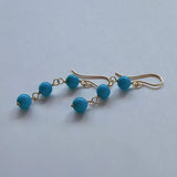 スリーピングビューティーターコイズの丸玉三連ピアス