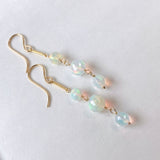 ラウンドカットオパールの三連ピアス