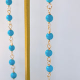 スリーピングビューティーターコイズの丸玉小ステーションロングピアス