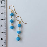 スリーピングビューティーターコイズの丸玉三連ピアス