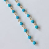 スリーピングビューティーターコイズの丸玉小ステーションロングピアス