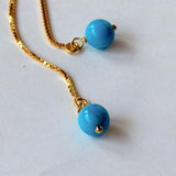 スリーピングビューティーターコイズの丸玉アメリカンピアス