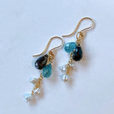 Moss aquamarine, blue zircon, and akoyaki pearl earrings