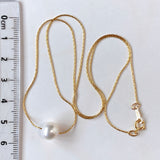 Akoya pearl through necklace